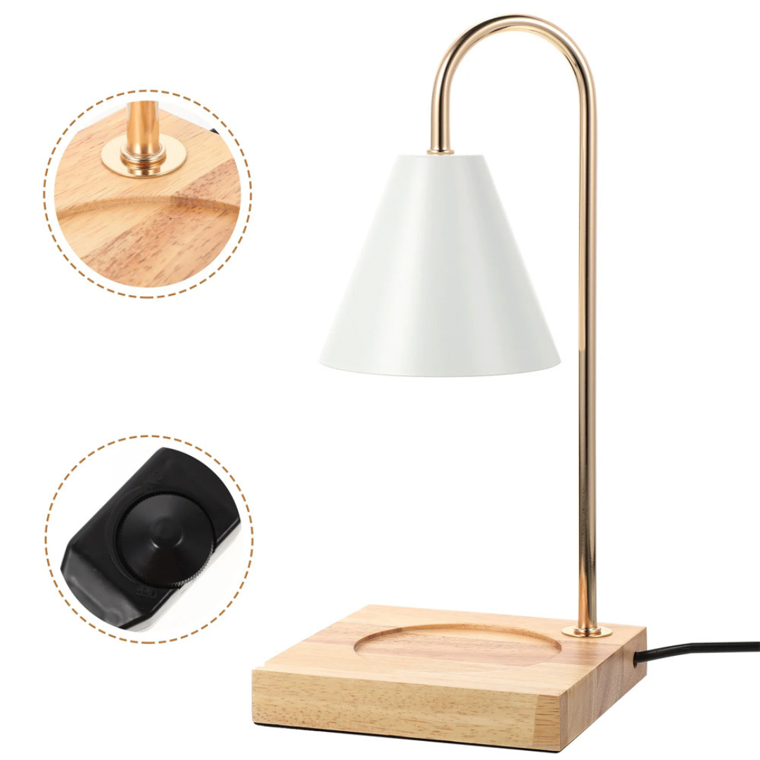 Table lamp with white shade, gold arm, and wooden base on a white background