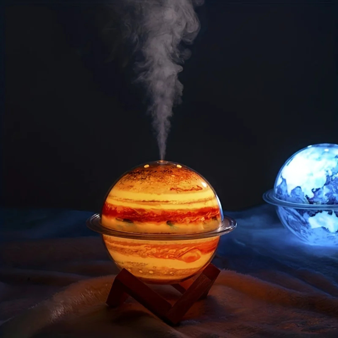 Planet-shaped humidifier emitting steam on a dark background