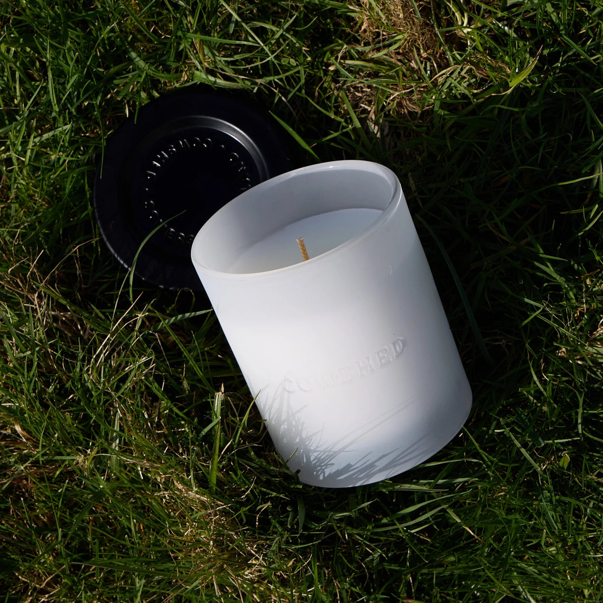 Cowshed Replenish Candle outdoor styled image