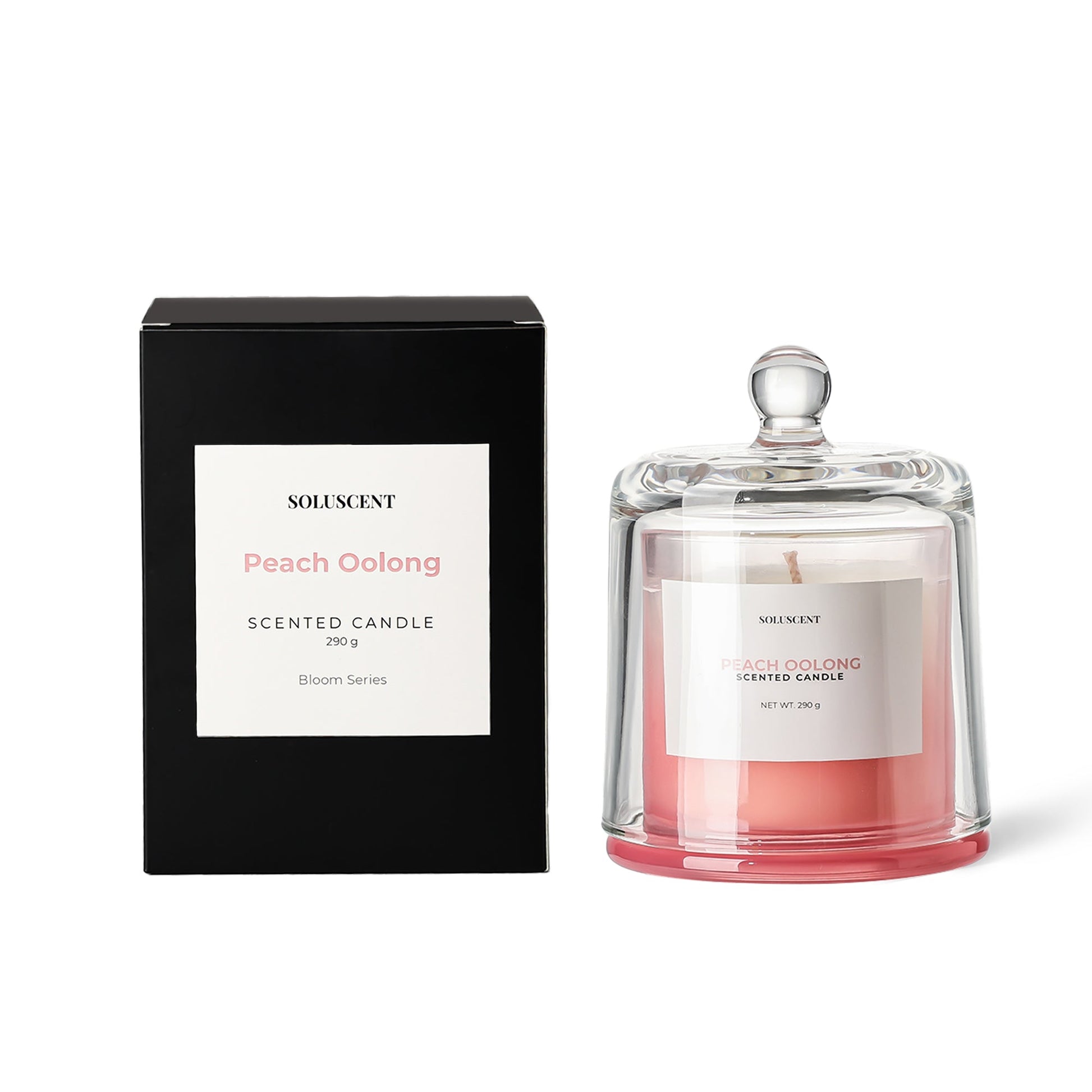 Soluscent Peach Oolong candle in reusable glass vessel beside presentation box