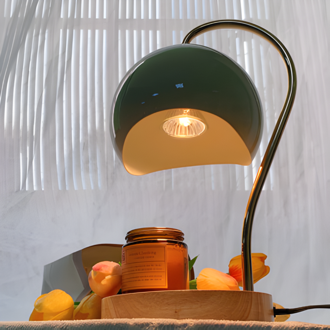 Scandinavian candle warmer lamp styled with flowers in a soft interior