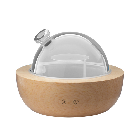 Wooden diffuser with glass container on a white background