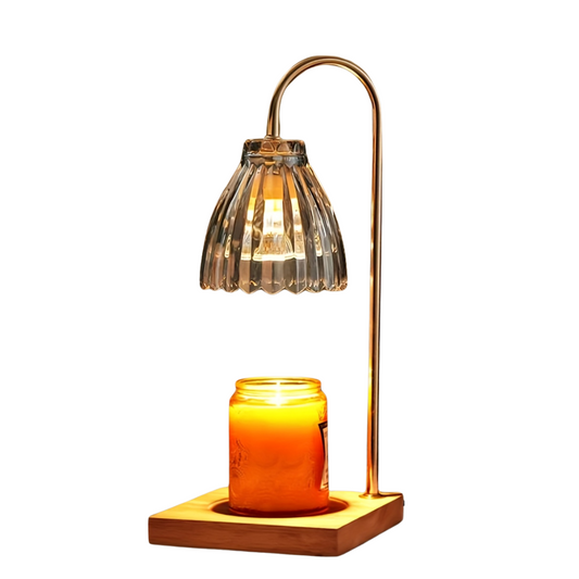 Decorative lamp with a glass shade and candle holder on a white background