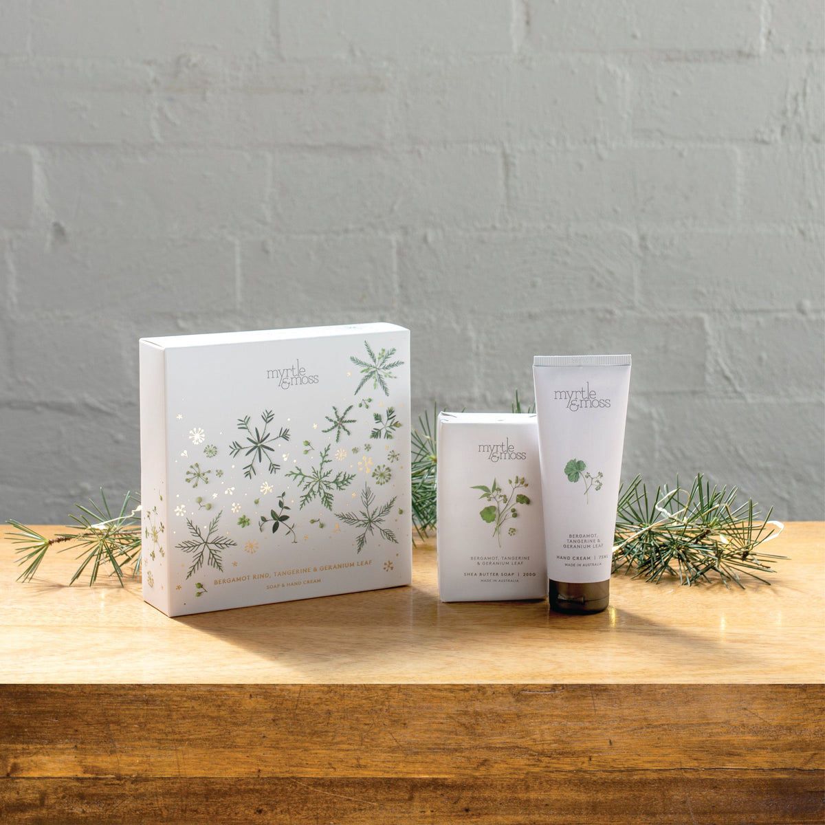Myrtle & Moss Christmas Duet Gift Set Bergamot Rind, Tangerine & Geranium Leaf - product and Christmas packaging