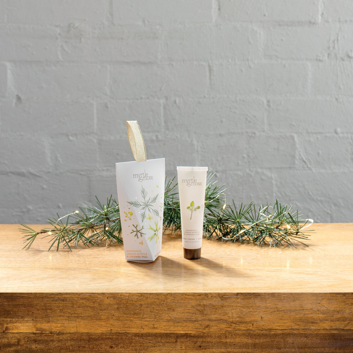 Myrtle & Moss Christmas Hand Cream Ornament Mandarin, Lemon Myrtle & Orange Peel 30mL - product and Christmas packaging