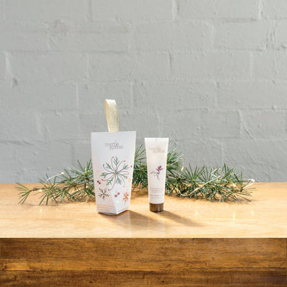 Myrtle & Moss Christmas Hand Cream Ornament Rose Geranium, Grapefruit & Clary Sage 30mL - product and Christmas packaging