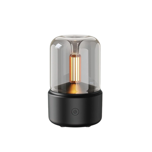 Modern black and clear glass table lamp on a white background