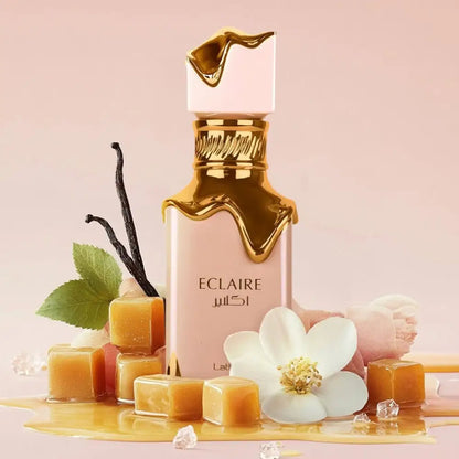 Lattafa Eclaire styled with caramel vanilla and white flowers