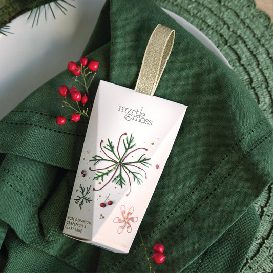 Myrtle & Moss Christmas Hand Cream Ornament Rose Geranium, Grapefruit & Clary Sage 30mL - official styled Christmas photograph