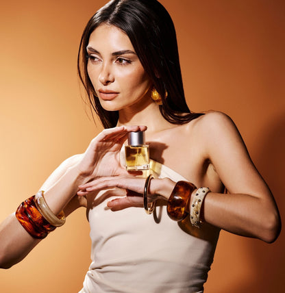 Recreation Lucky Chaos Eau de Parfum styled in golden light