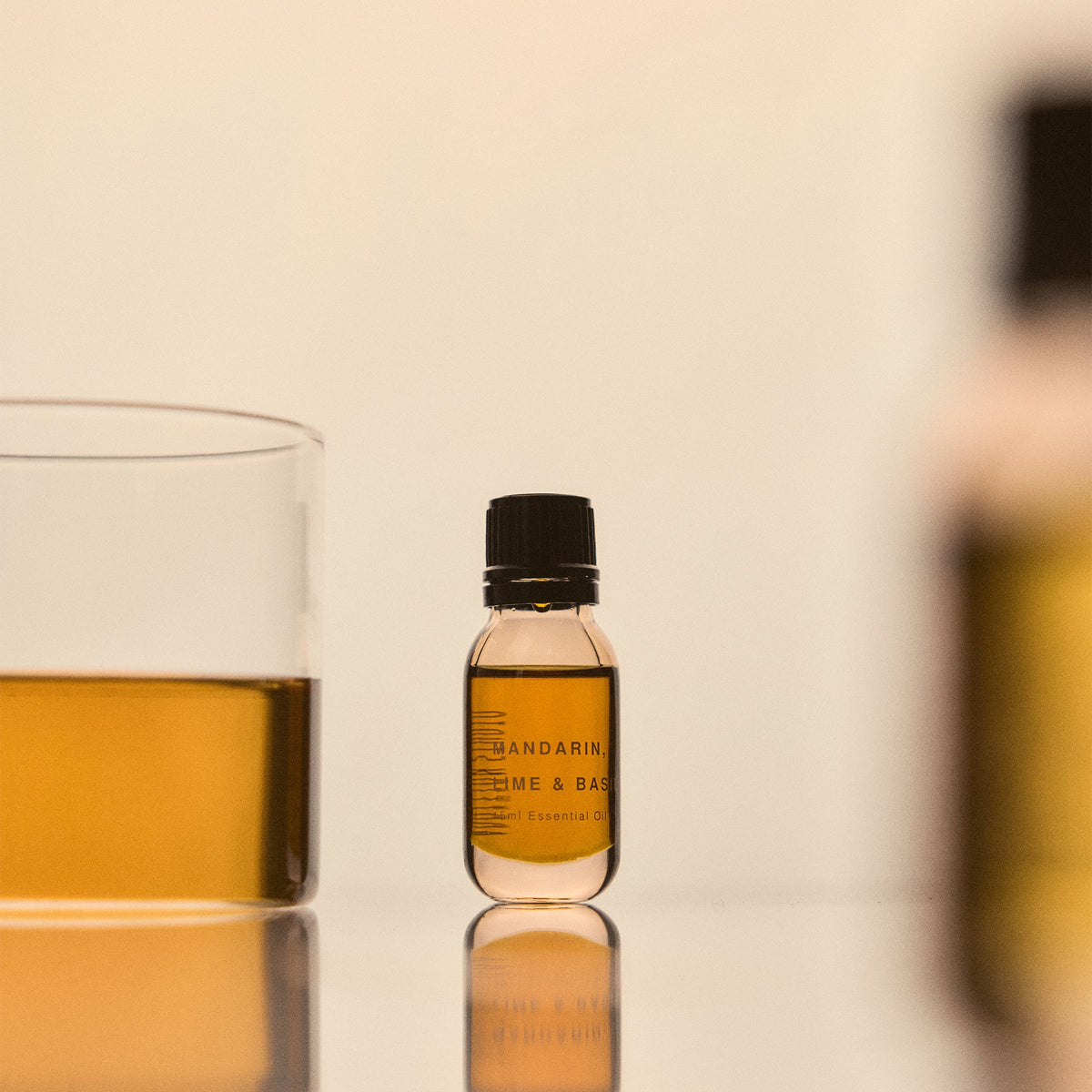 Addition Studio Mandarin, Lime and Basil Essential Oil 15mL — official styled detail photograph