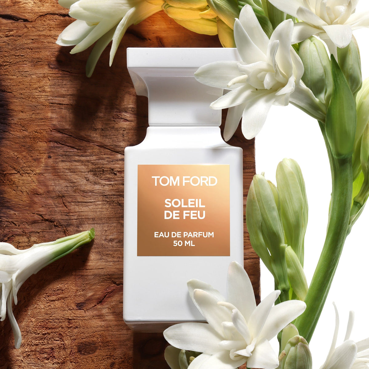 Tom Ford Soleil de Feu Eau de Parfum styled with tuberose