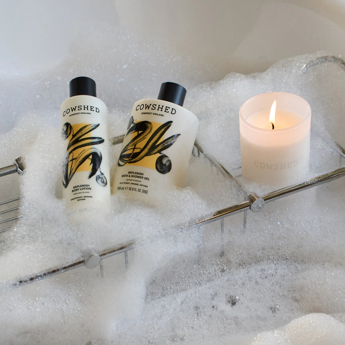 Cowshed Replenish Candle bath lifestyle image