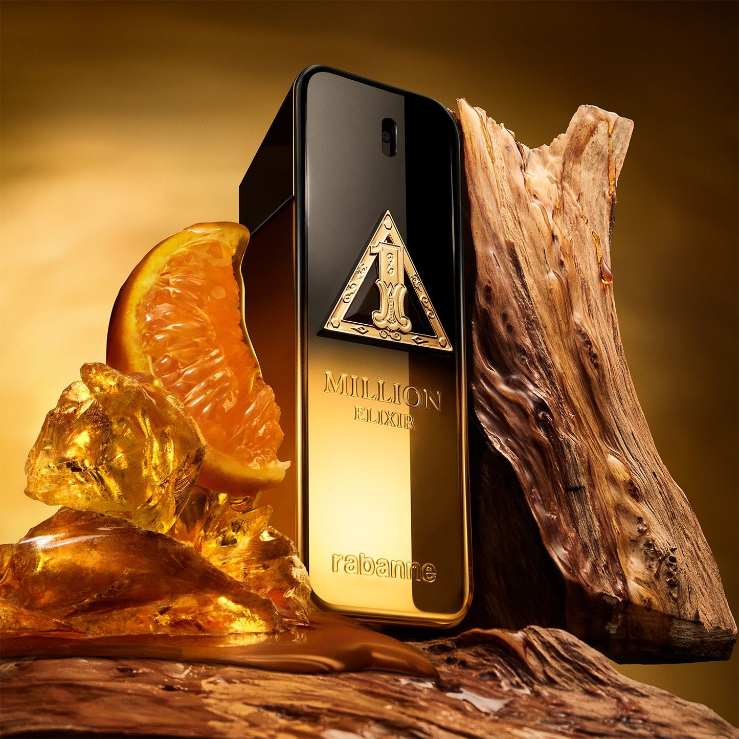 Rabanne 1 Million Elixir styled amber and wood campaign image